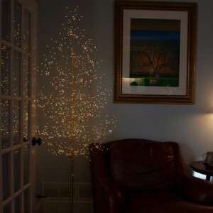 gold-fairy-light-tree-reading-chair2 gold fairy light tree reading chair